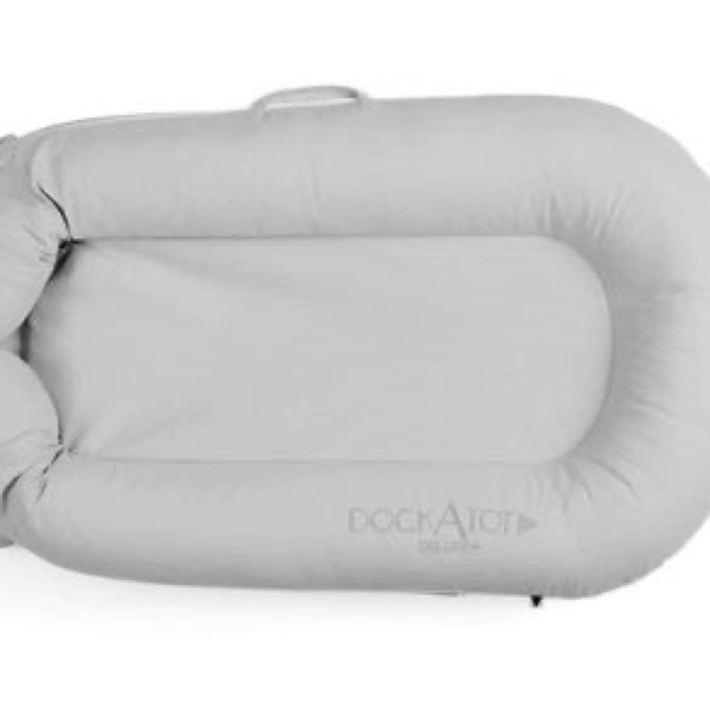 Dockatot Deluxe+ with grey cover